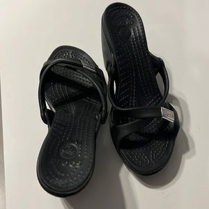 Crocs cyprus size 7 wedge sandals.